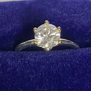14k white gold 1ct Moissanite engagement ring.
